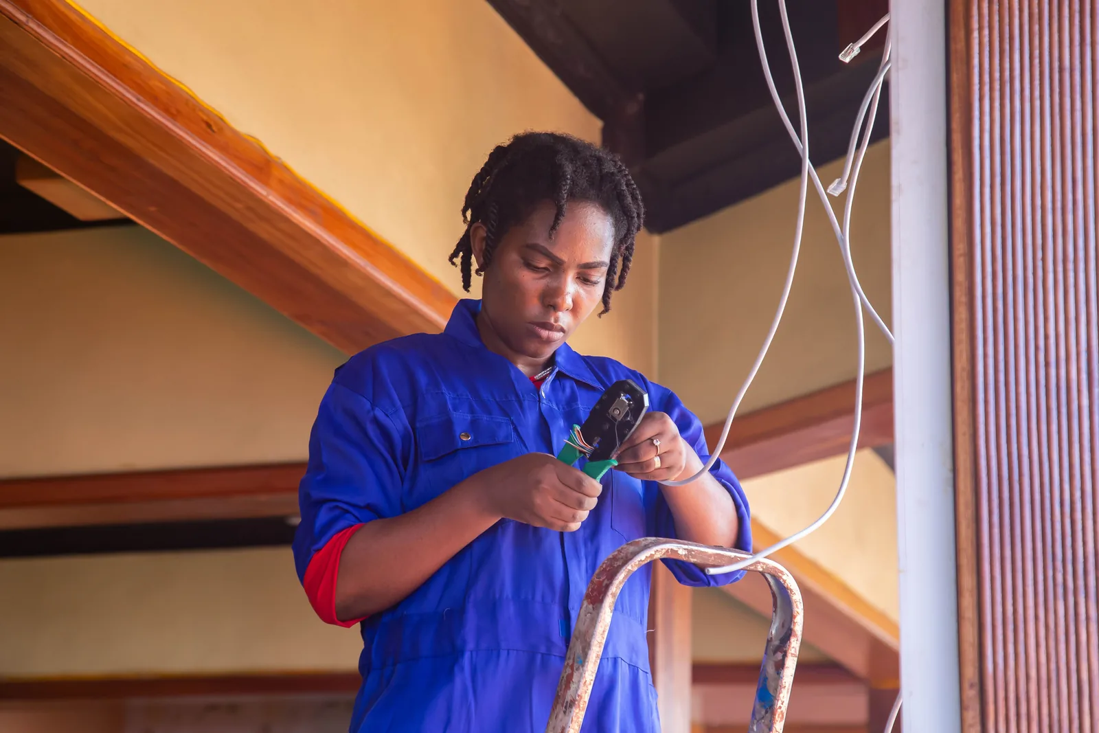 Terminating a cable from a step ladder, for code violation in Vancouver
