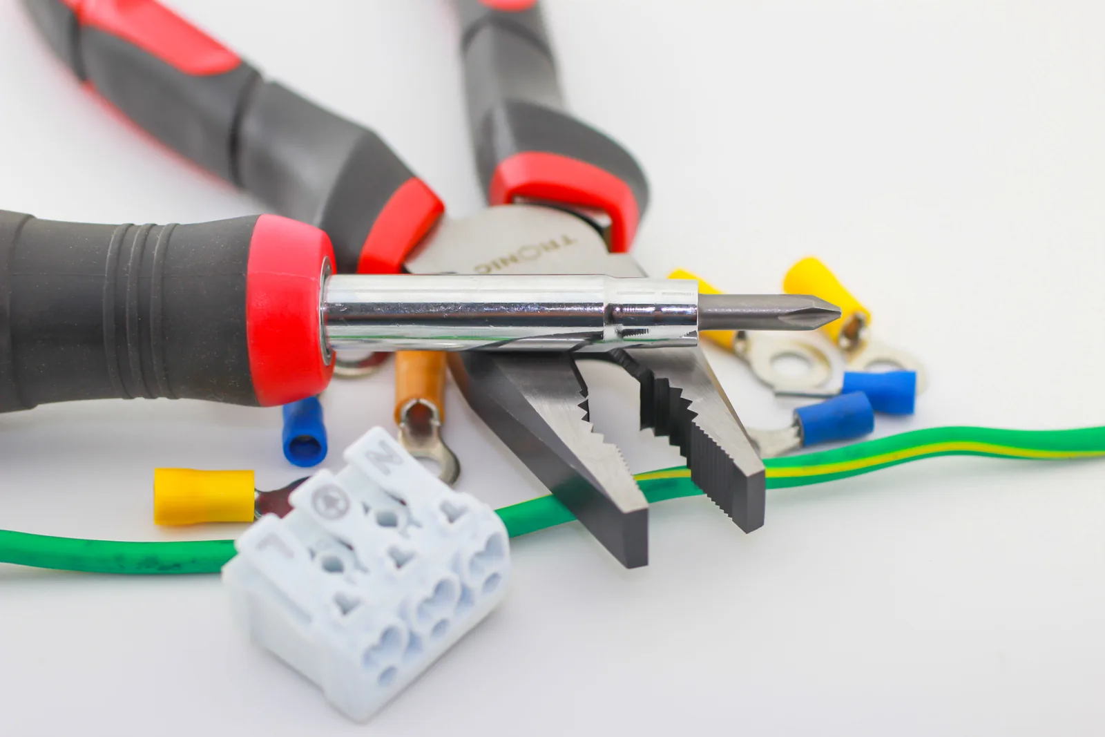 Pliers, a screwdriver, ferrules and a connector block, for electrician in Vancouver