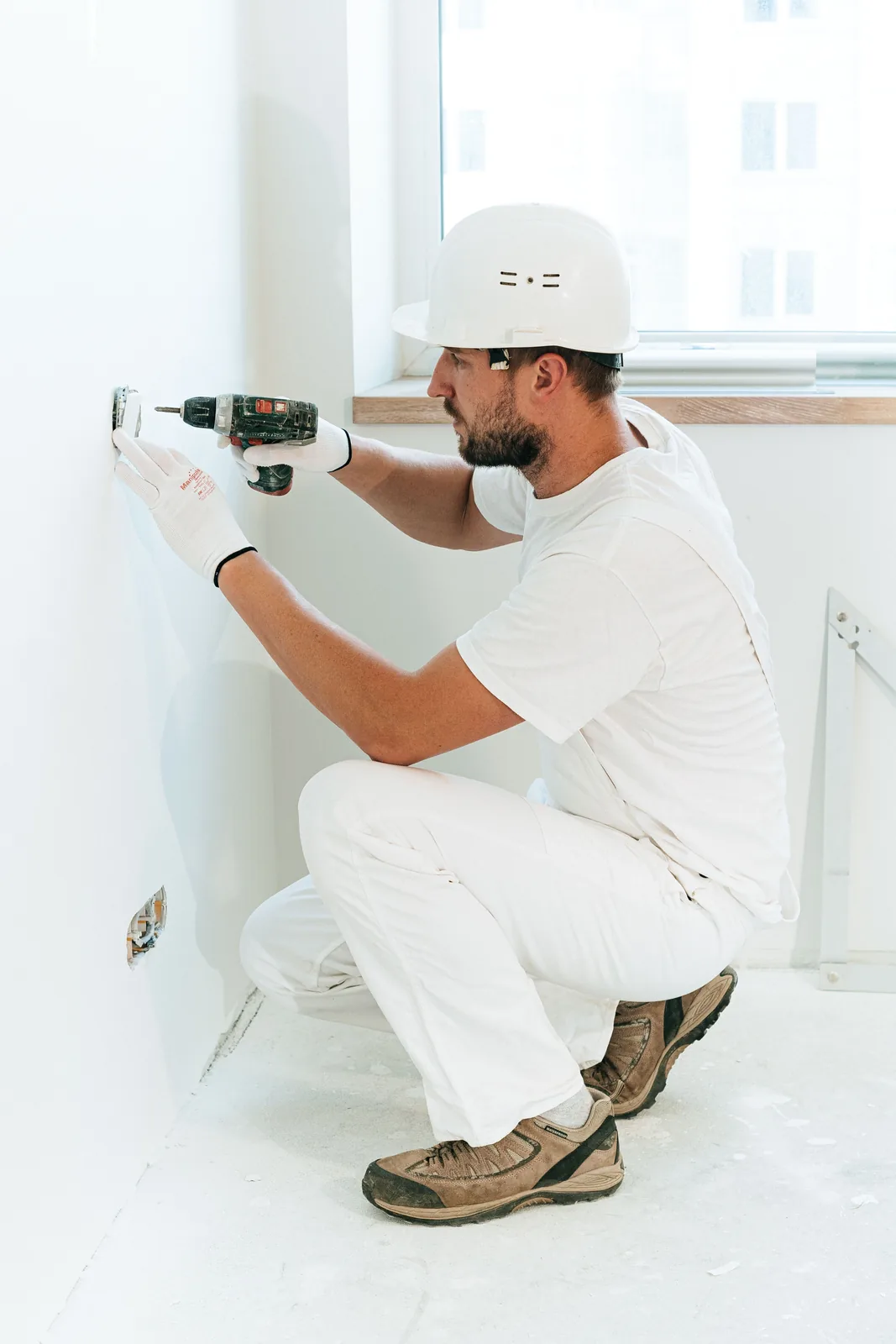 Fixing a socket into a finished wall, for electrician in Vancouver